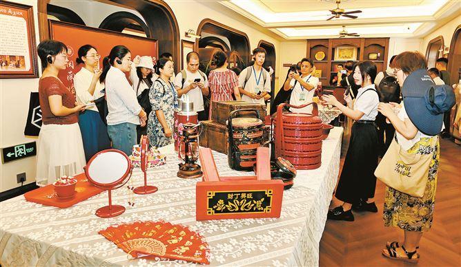 “活力中国调研行”聚焦“甜蜜经济” 感受社区新活力(图2)